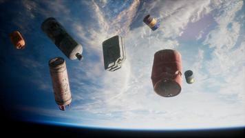 Space debris, pollution of the atmosphere of the planet Earth and space by human waste. Elements furnished by NASA video