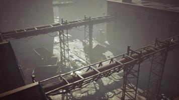 Abandoned factory with concrete ruins in industrial district video