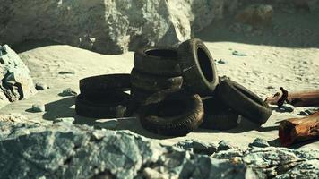 old abandoned tyres on sea shore video