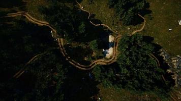 Aerial view of the road through the forest video