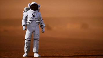 Astronaut on Mars Surface. Red Planet Covered in Gas and rock video