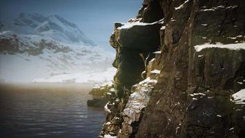 snow covered mountains in northern ocean video