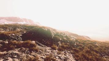 landscape of mountains with dry grass in summer season video