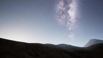 Milky Way stars above desert mountains video