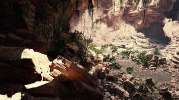 cave in an extinct volcano covered with grass and plants video