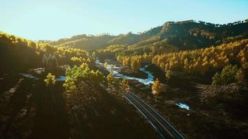 8k aerial panoramic landscape view of a scenic road in Canadian Mountains video