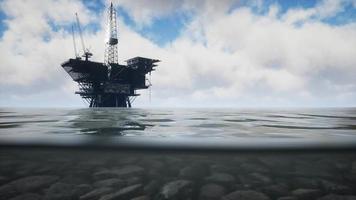 Large Pacific Ocean offshore oil rig drilling platform video