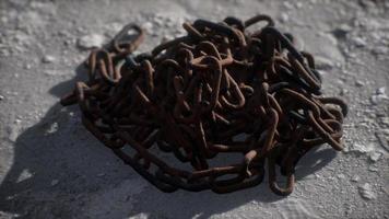 Vintage rusty hand-made iron chain