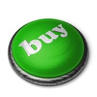 Comprar palabra en botón verde aislado en blanco foto
