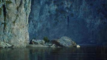 rocky cliffs in the ocean at sunny day video