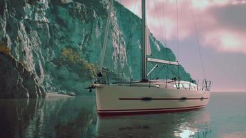 yacht in the sea with greeny rocky island video