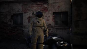 Lost Astronaut near Abandoned Industrial Buildings of Old Factory video