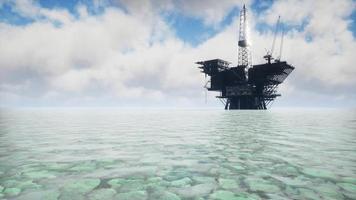 Large Pacific Ocean offshore oil rig drilling platform video