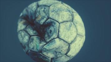 old deflated leather soccer ball