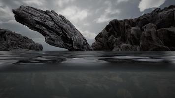 Half underwater in northern sea with rocks video