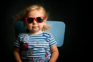Funny baby with sunglasses photo