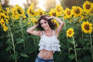 girl in the field of sunflowers outdoor photo