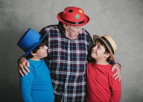 funny grandfather with his grandchildren photo