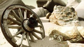 old tradition waggon wheel on the sand video