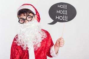 niño disfrazado de santa claus foto