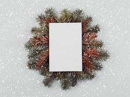 Christmas concept background.Christmas tree branches with White board photo