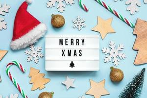 Merry Christmas.Light box with the text Merry Xmas and Christmas decoration.Christmas concept background photo