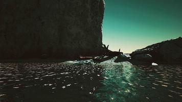 Hyperlapse of deserted beach and rocky cliff video