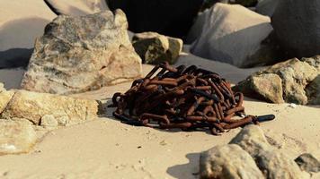 old rusted chain in the sand video