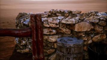 old stone water well in the desert video