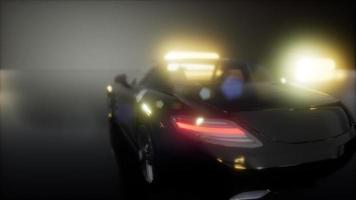 luxury sport car in dark studio with bright lights video