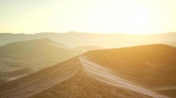 Aerial view on big sand dunes in Sahara desert at sunrise video