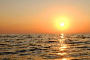 Sunset on the beach, Beautiful gray and orange cloud summer beach, Sea and sand photo