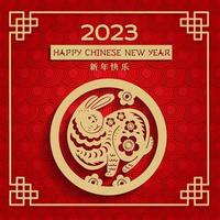 Chinese new year 2023 greeting card with Rabbit Zodiac sign. Banner with gold paper cut art and craft style on red background. Chinese Translation- happy new year 2023. Vector 3d illustration.