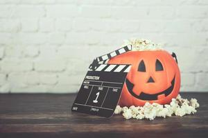 Happy Halloween.Halloween pumpkin with popcorn photo