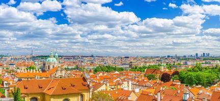 Panorama of Prague historical city centre with dome of Saint Nicholas catholic Church photo