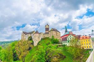Loket Castle Hrad Loket gothic style building on massive rock and colorful buildings in Loket town photo
