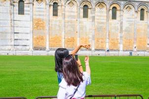 Tourists traveler asian chinese, japanese female women girls are posing, having fun photo