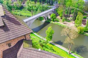 Bridge over Eger river top aerial view from walls of Loket Castle Hrad Loket gothic style building photo