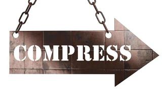 compress word on metal pointer photo