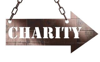 charity word on metal pointer photo