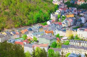 Karlovy Vary Carlsbad historical city centre top aerial view with colorful beautiful buildings photo