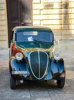 Vintage classic retro automobiles cars in Italy photo