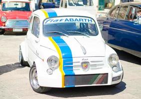 Vintage classic retro automobiles cars in Italy photo