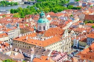 Top aerial view of Prague historical city centre with red tiled roof buildings photo