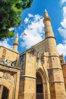 Selimiye Mosque or Cathedral of Saint Sophia or Ayasofya Mosque building with minarets in North Nicosia historical city centre photo