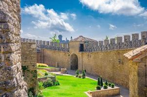 Republic San Marino Stone brick fortress wall with merlons and courtyard of Prima Torre photo