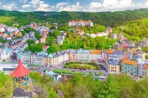 Karlovy Vary Carlsbad historical city centre top aerial view with colorful beautiful buildings photo