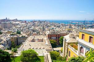 Top aerial scenic panoramic view from above of old historical centre quarter districts of european city Genoa photo