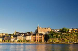 Lake Malaren water and Mariahissen building, Stockholm, Sweden photo