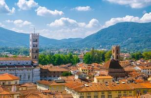 Aerial top panoramic view of Duomo di San Martino San Martin cathedral bell tower in historical centre medieval town Lucca photo